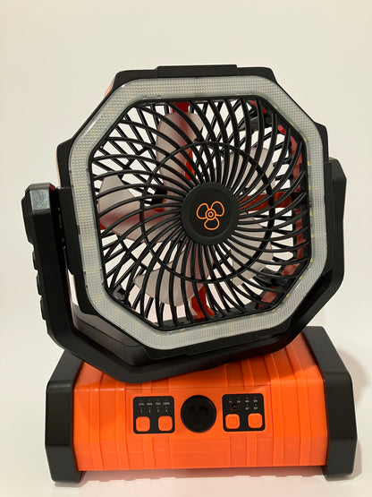 A portable octagonal fan and light combo with a black and orange design, featuring a built-in LED light ring around the fan blades.